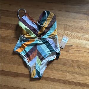 Biliblond striped swimsuit. slight swimmer